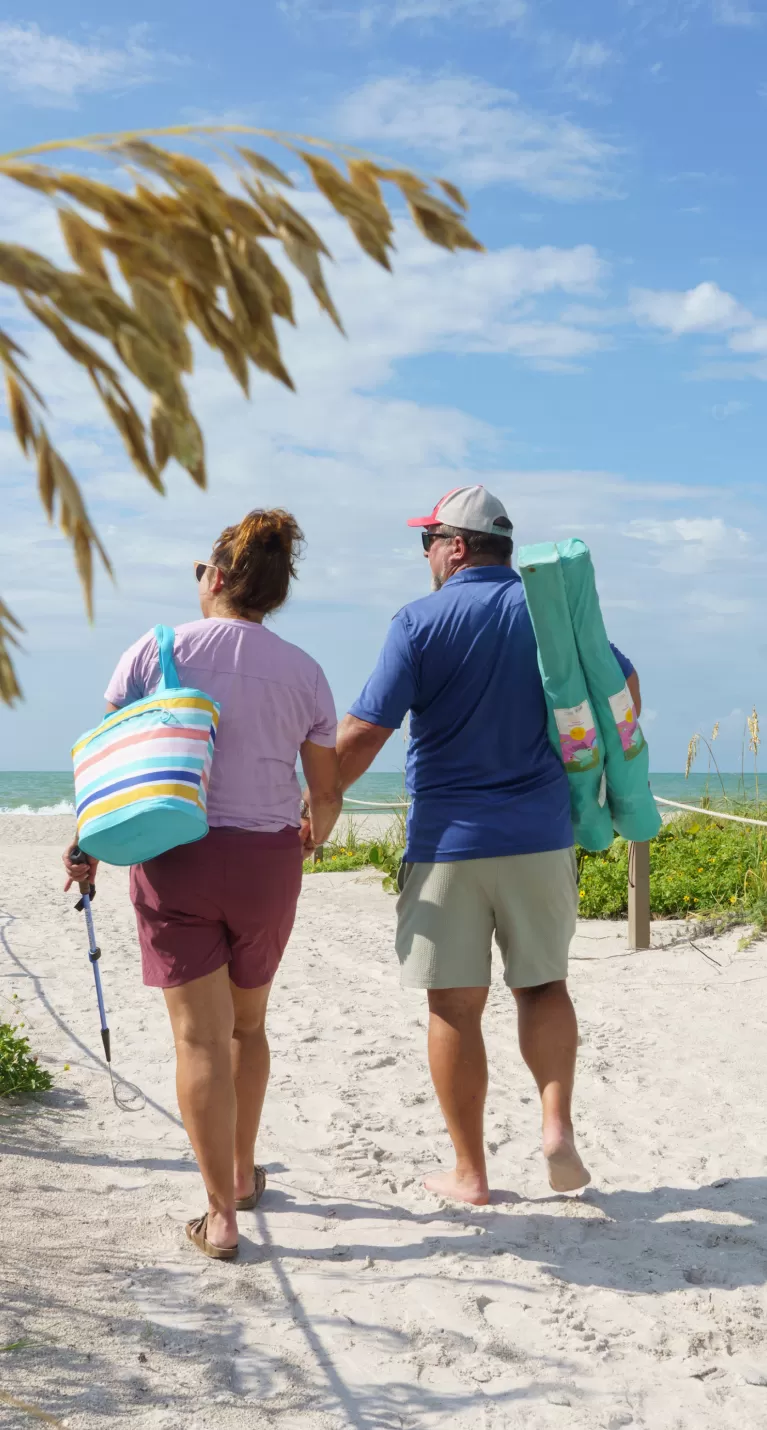 Couple headed to a wonderful day at the beach